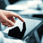 man holding tablet man holding tablet